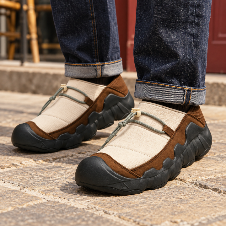 Cream and brown toggle shoes worn with cuffed jeans