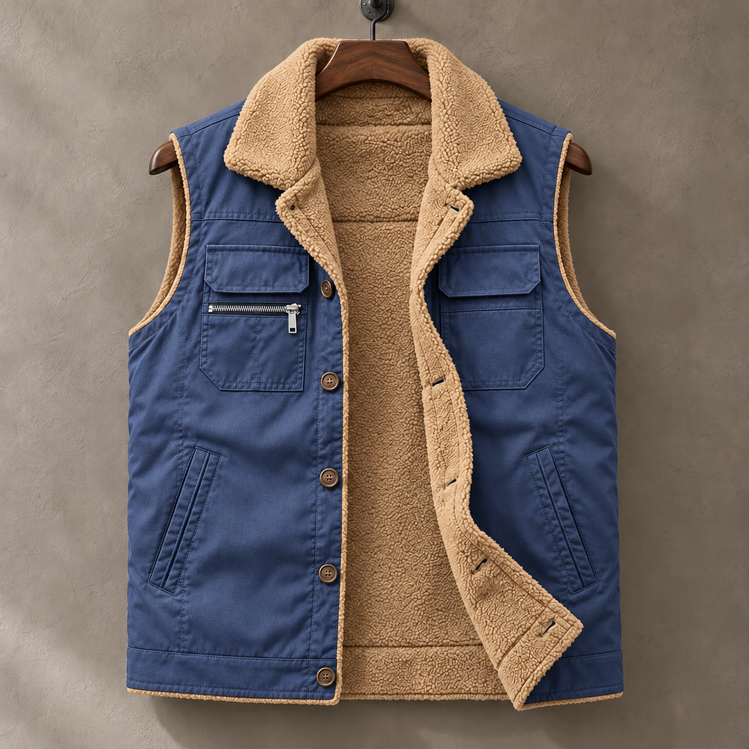 Blue Hudson plush-lined vest on a wooden hanger, open to reveal tan lining
