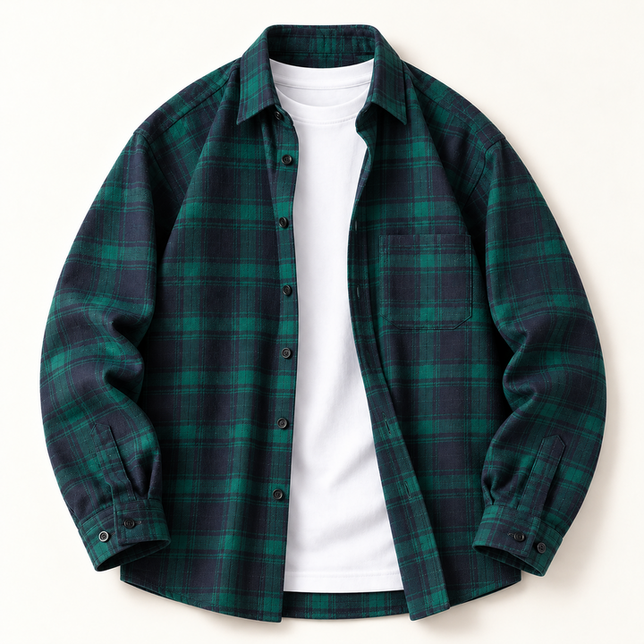 Open-front green and navy plaid flannel shirt styled over a white T-shirt.